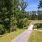 Walking trails around trees and lush landscaping