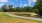 Walking trails around trees and lush landscaping