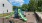Playground with green features and fence