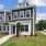 townhomes with walkways and grass