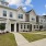 row of townhomes with walkways and grass