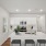 Cannalily Kitchen with white cabinets and stainless steel appliances