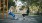 two women talking sitting on some swings