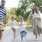 a family walking in a park